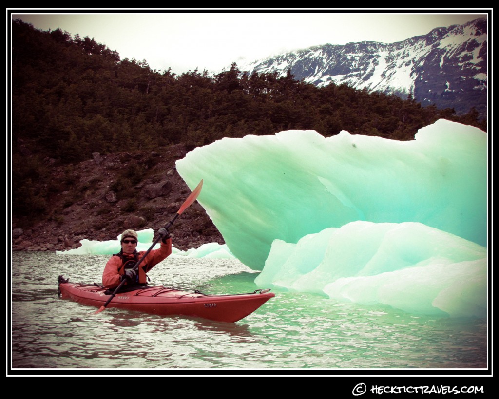 Pete in front of an iceberg