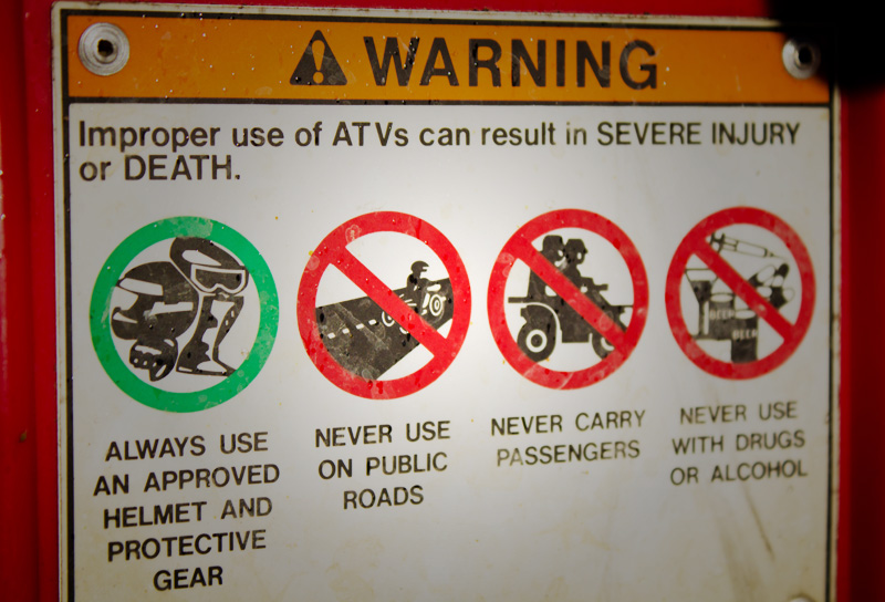 Quadding warning label