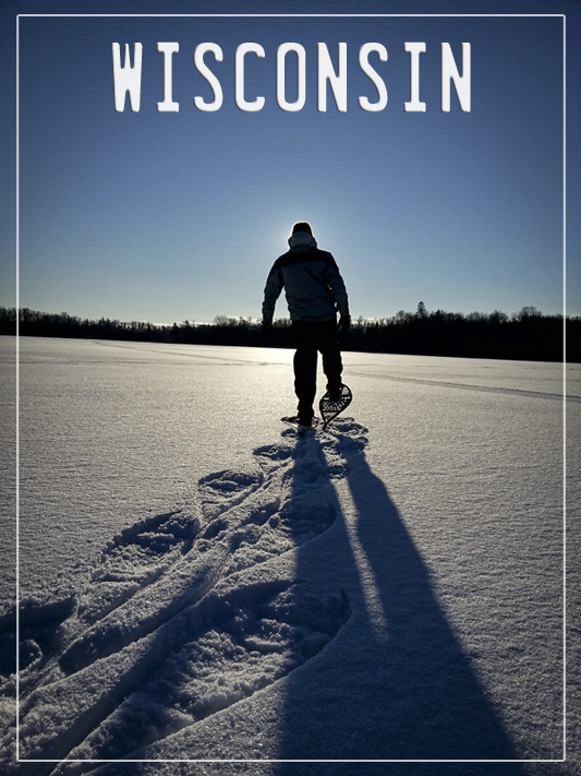 Snowshoeing on a frozen lake