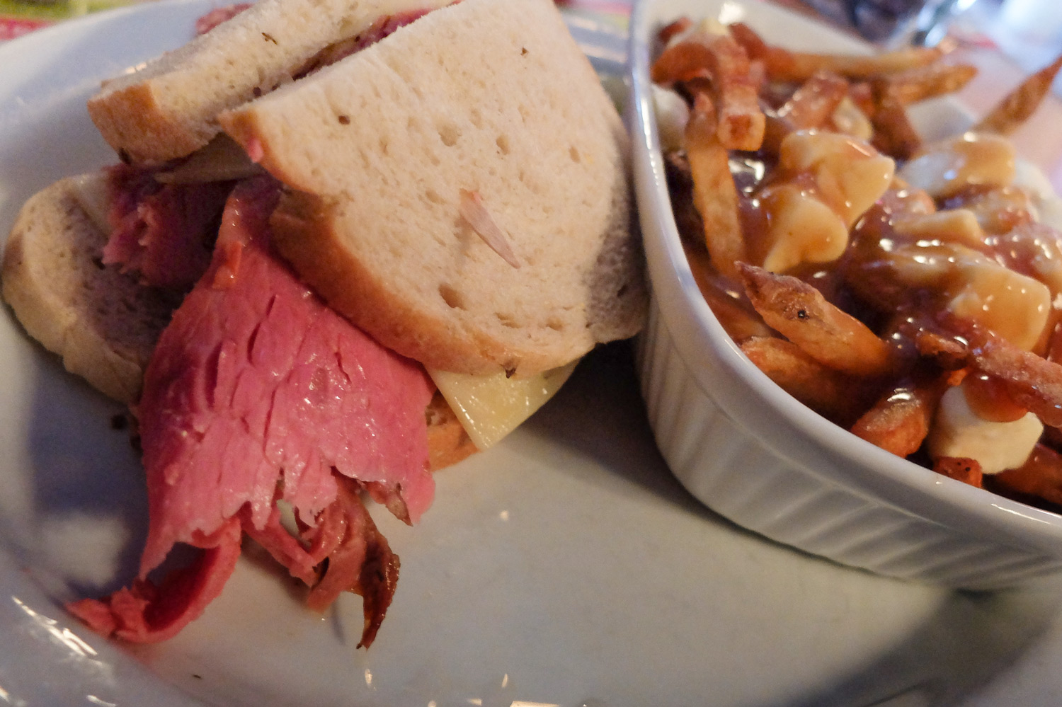 Smoked Meat Sandwich and Side of Poutine