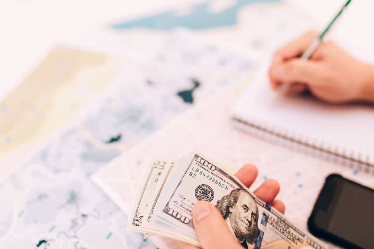 counting money and taking notes