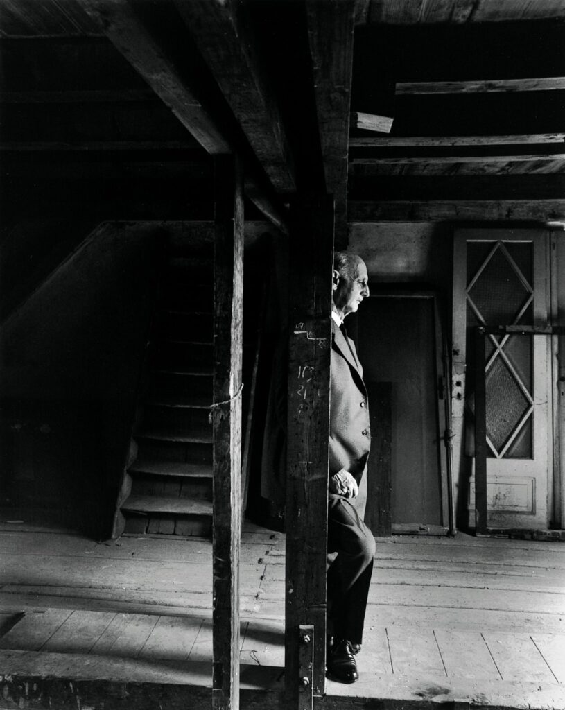 Otto Frank standing in the Annex of The Anne Frank House