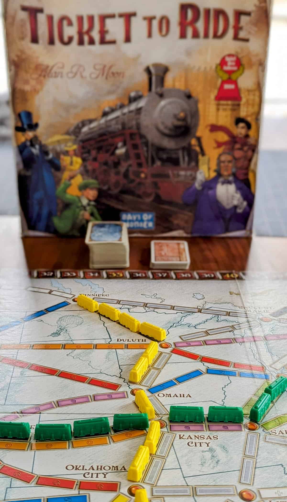 Ticket to Ride and box - build train routes across America with this travel game.